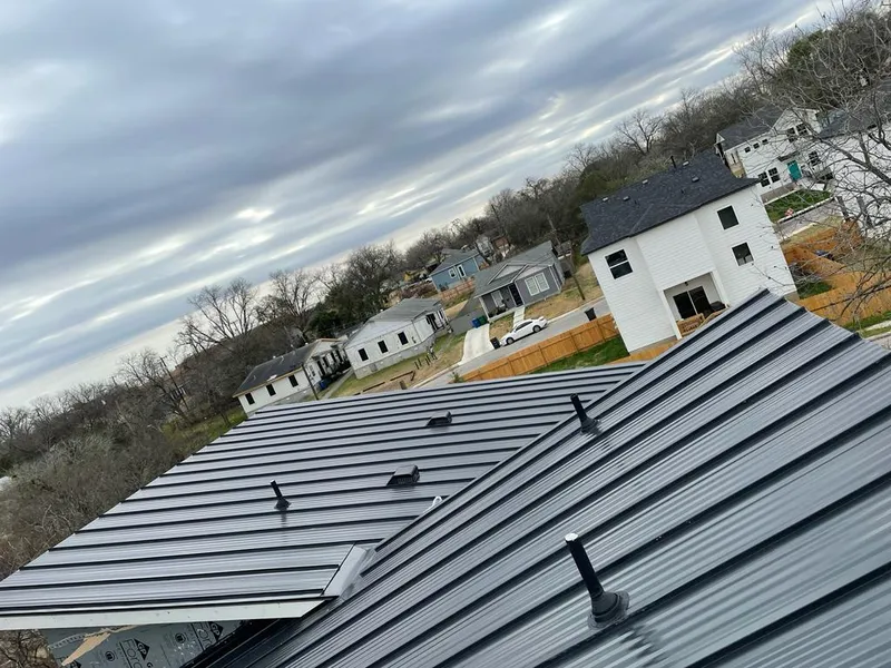 Standing seam metal roof panels with vents for Skylight Repair in Northbrook